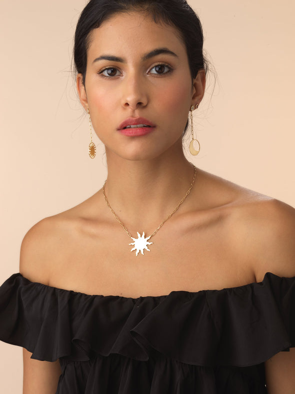 Model wearing Big Sun Necklace in gold