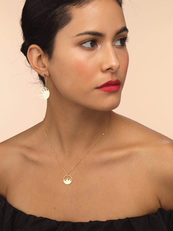 Model wearing gold small wave necklace