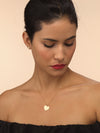 Adult model wearing gold heart Amalia necklace