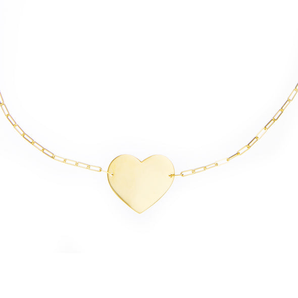 Handmade gold necklace with symbolic heart charm 