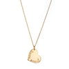 Sideways gold charm on gold chain 