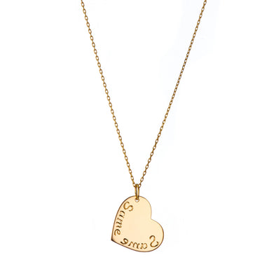 Sideways gold charm on gold chain 