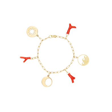 Handmade gold bracelet with gold talismans and red coral charms. 