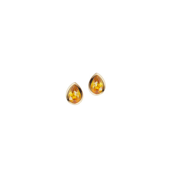 Handmade gold earrings with yellow sapphires. 